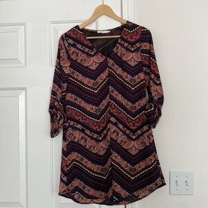 Lush v-neck shift mini dress with bold patterns.